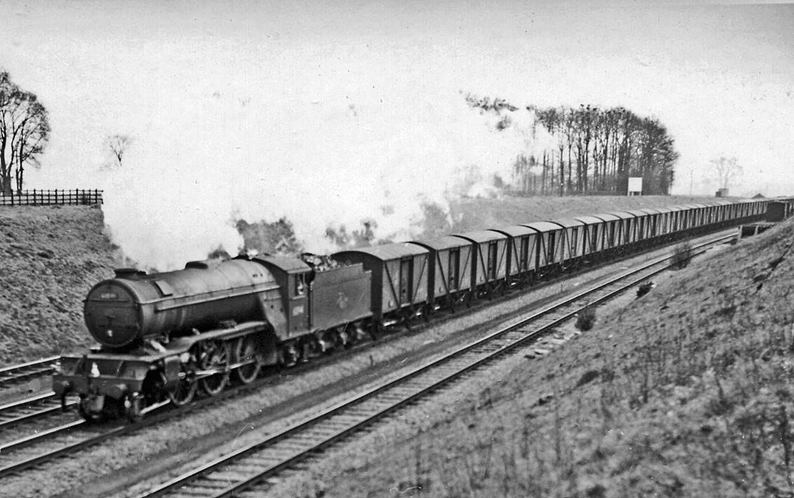 Down 'Blue Spot' fish empties north of St Neots 28th March 1959
The returning northbound empties of the premier Fish train which rushed North Sea fresh fish from Grimsby etc. to London before the Motorway Age - at much higher speed than can even now be achieved by road. The locomotive is V2 no.60941.
 Copyright Ben Brooksbank (CC by SA/2.0)
